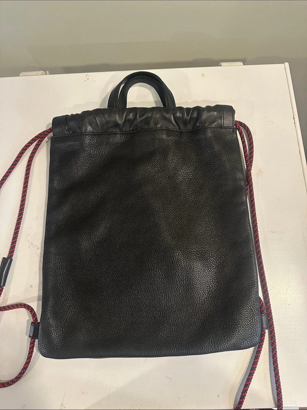 Gucci Black Leather Drawstring Backpack with Signature Web Stripe